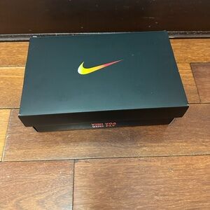 Nike Black Vini Jr Box with Yellow-Red Swoosh new